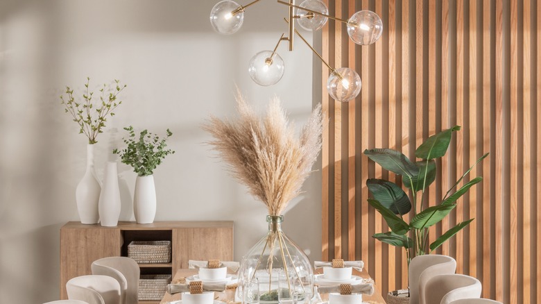 Chandelier hanging above dining room