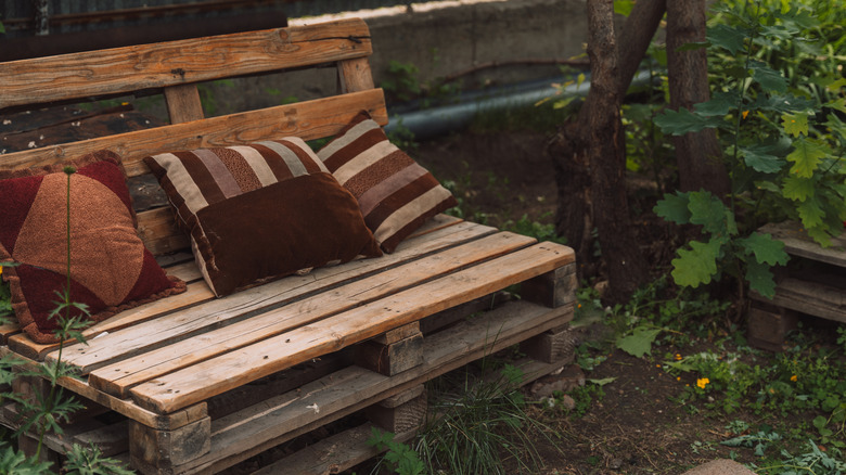 Bench made from used wood pallets.