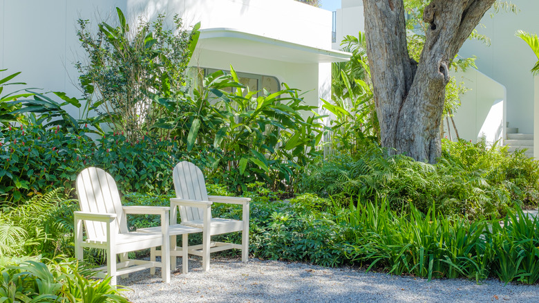 Small gravel patio with chairs.