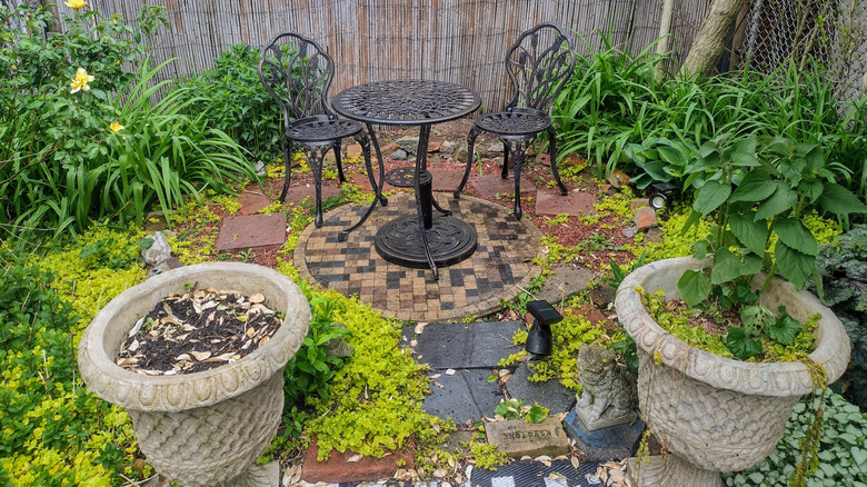 Stone patio made with bricks and pavers.