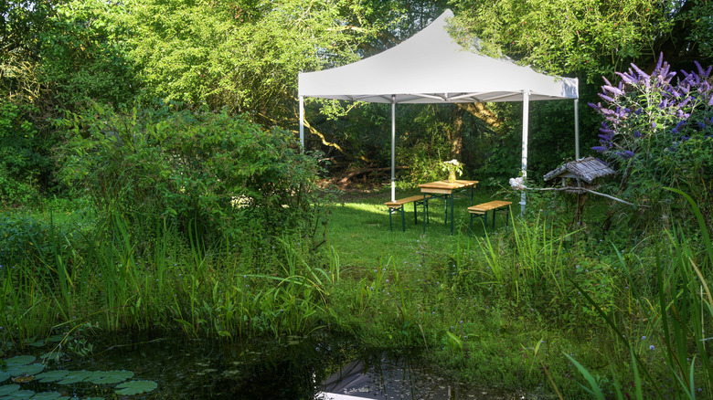 White camp pavilion in a garden