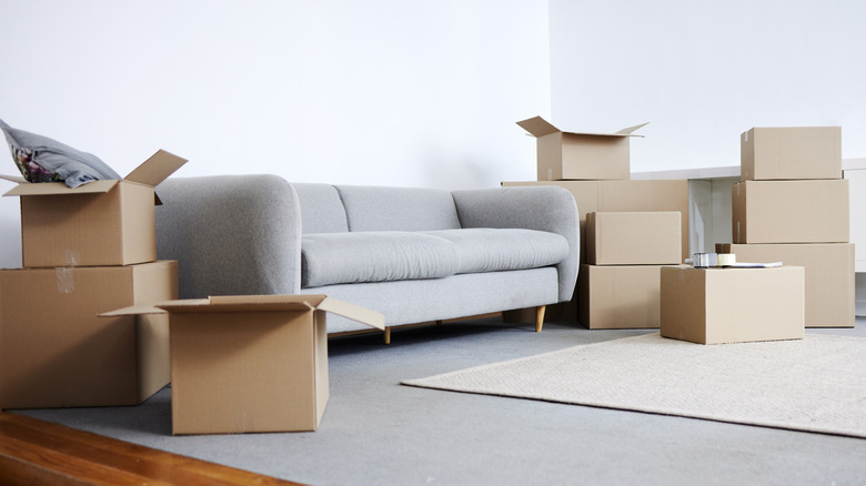 Several boxes around a couch