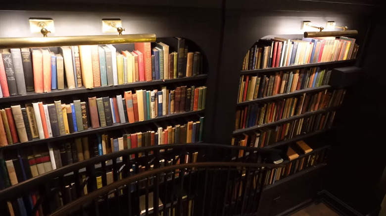 Colorful bookshelves in the library at Hotel 1928