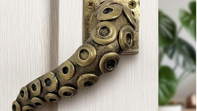 A door handle that looks like an octopus tentacle.