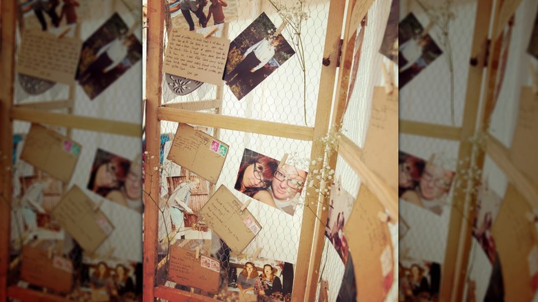 Room divider with chicken wire and clipped ephemera