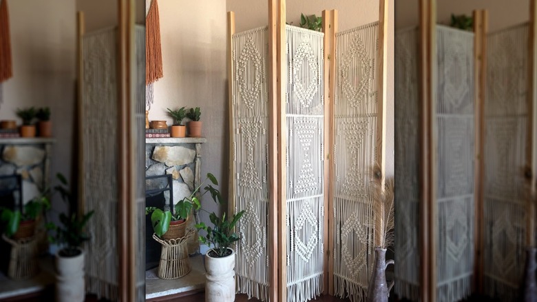 Woven macrame screen with wood frame