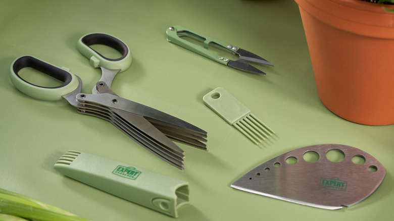 A set of tools designed for pruning and harvesting homegrown herbs.