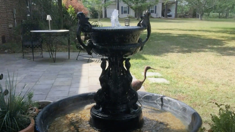 Kiddie pool fountain near patio