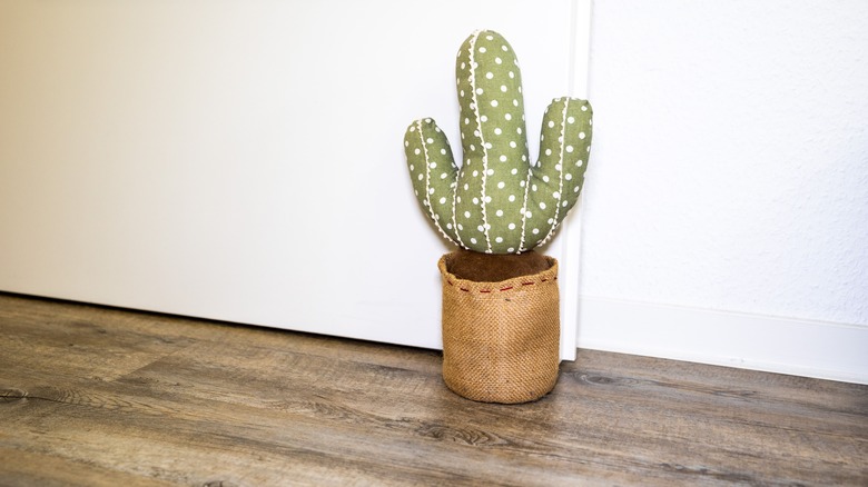 a cactus shaped door stop