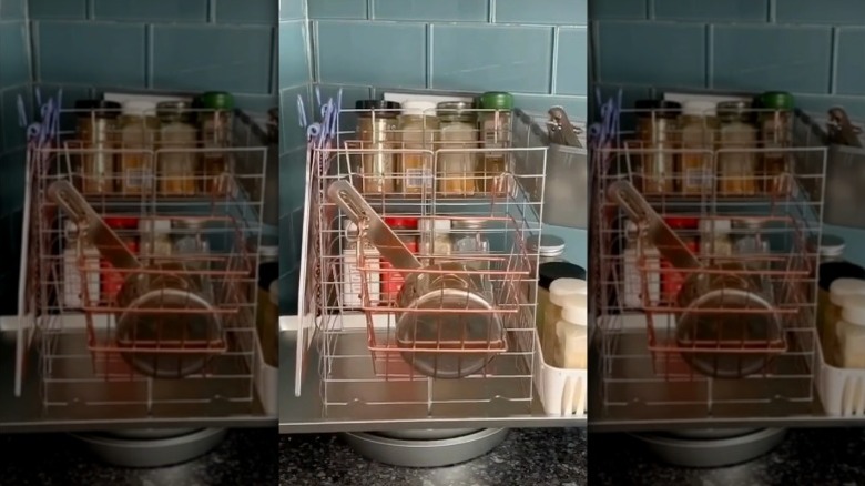 Racks sit atop two pie tins filled with marbles to create a countertop rotating storage station.