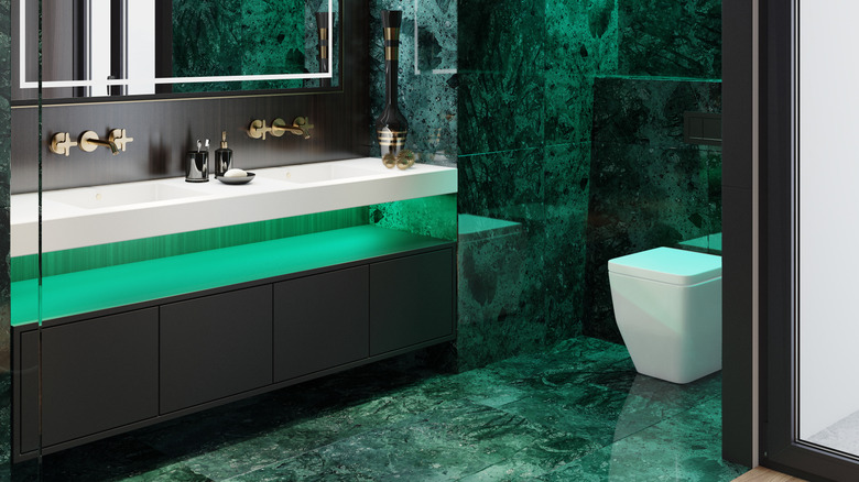 Emerald green tiles in a vintage bathroom