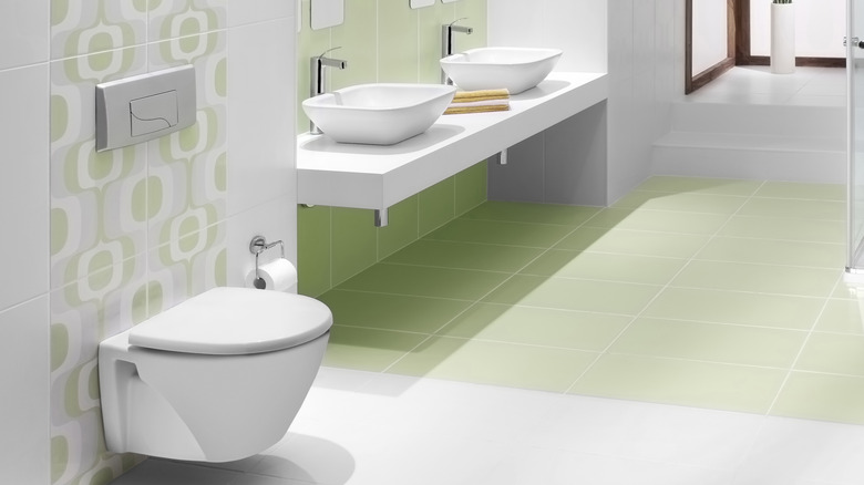 Avocado green vintage bathroom tiling