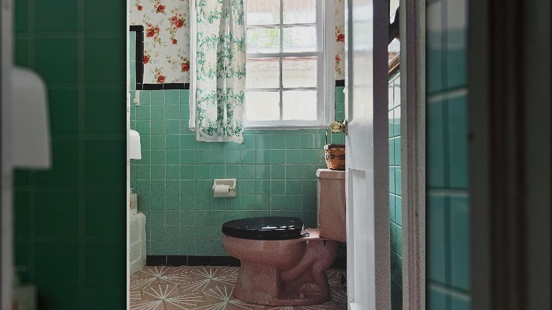 Seafoam green tile bathroom wall