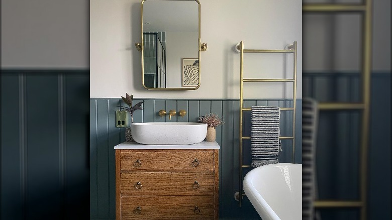 Blue wood paneling bathroom