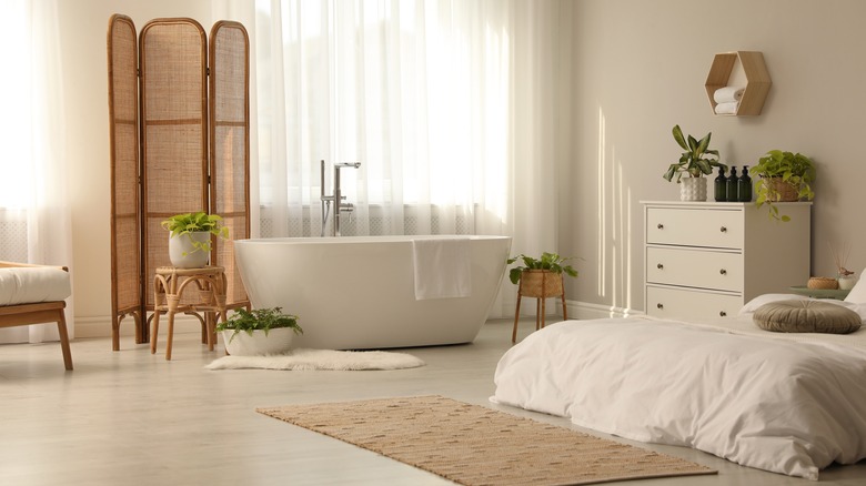 bedroom with bath tub