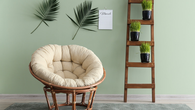 pale green wall with chair