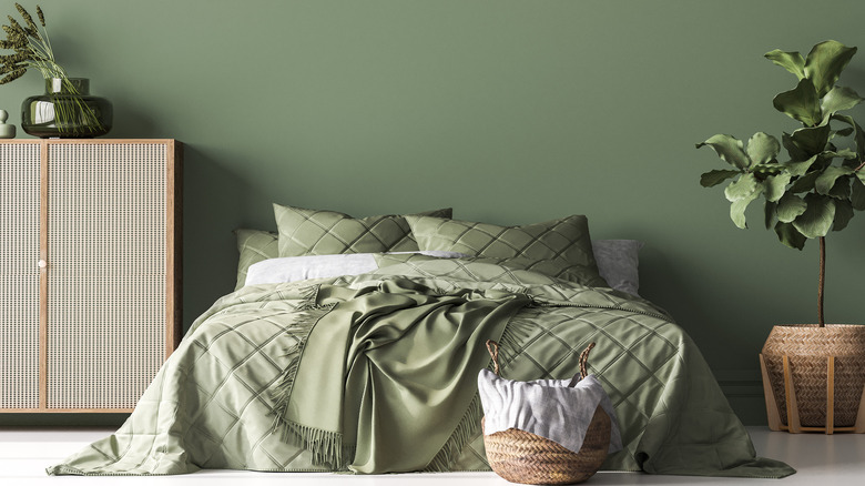 bedroom decorated in sage green