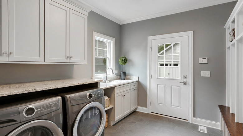 Clean gray laundry room