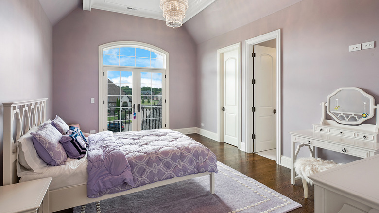 bedroom with light purple walls
