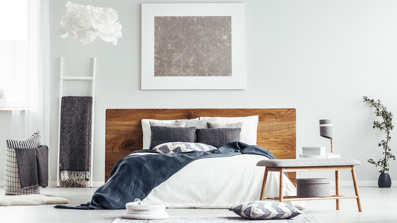 white blanket ladder in bedroom