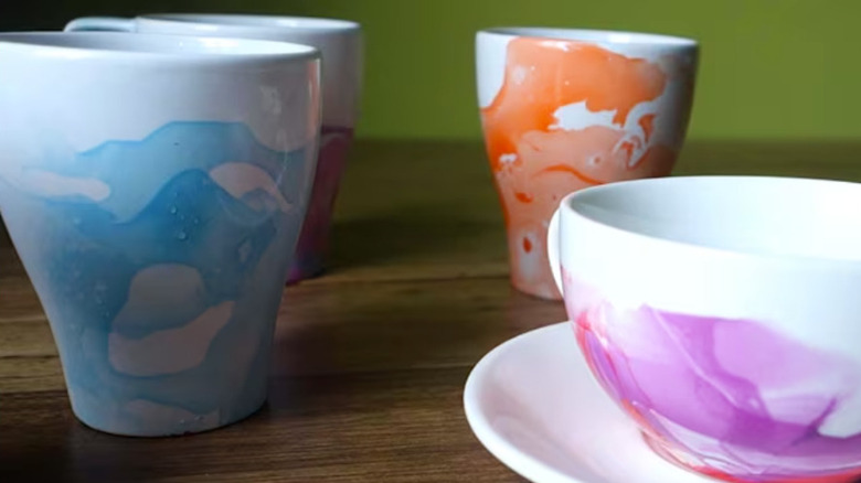 coffee mugs marbled with DIY nail polish project