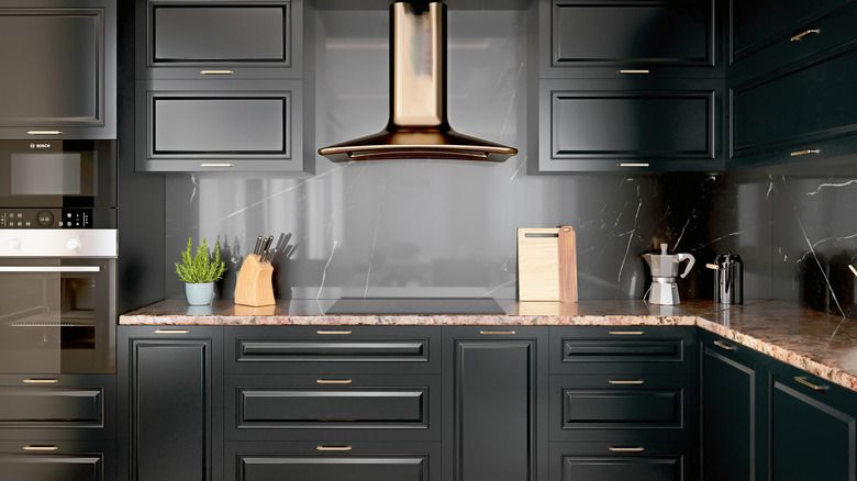 Black cabinets and granite countertops