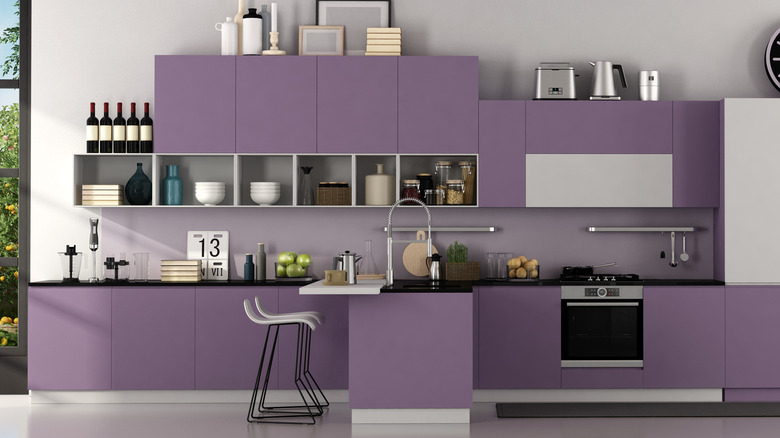 Lilac cabinets and black countertops