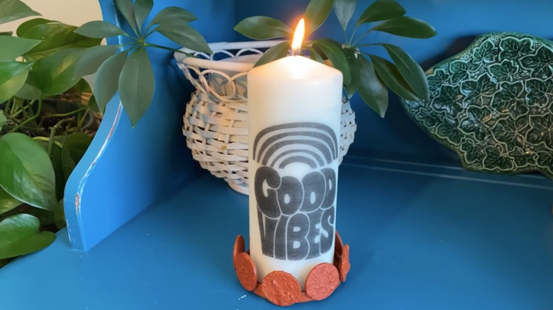 candle in DIY jar lid holder