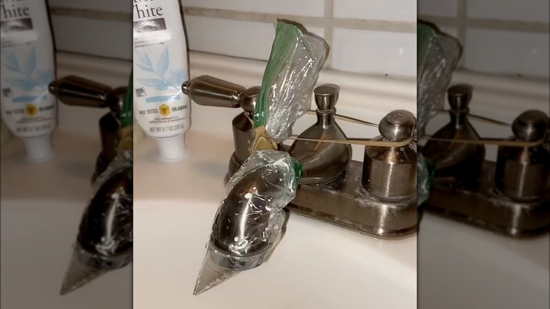faucet with plastic bag over it
