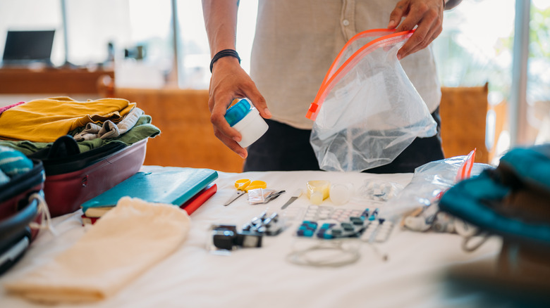 man packing baggy for trip