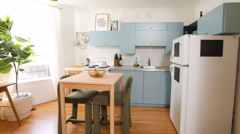 Kitchen with beige wood table