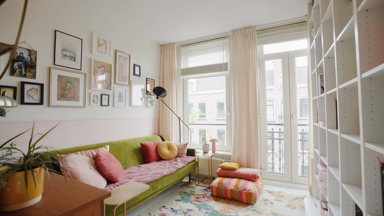 Bright room with green sofa
