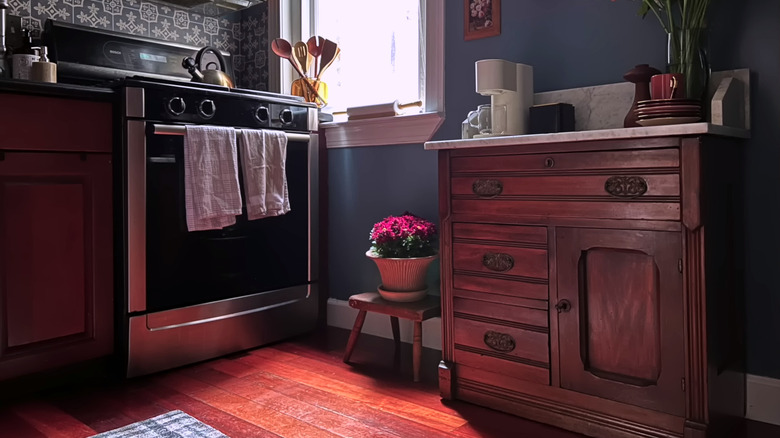 Kitchen with dark brown wood