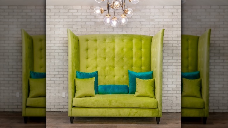 chartreuse couch and turquoise pillows