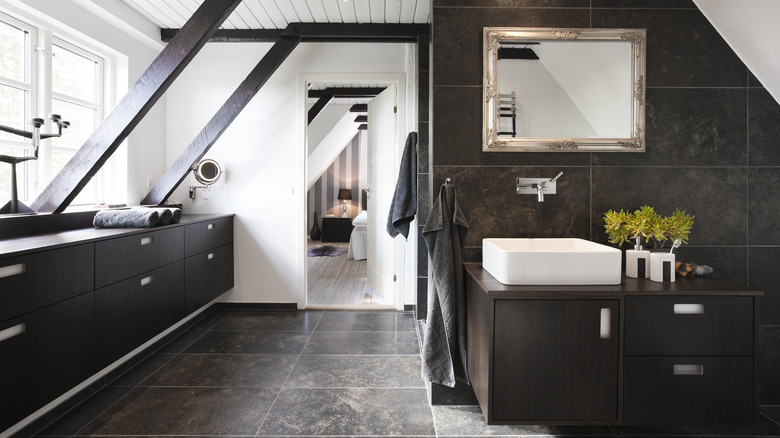 Black bathroom with white walls