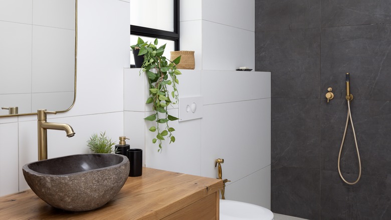 Gray bathroom with wood detail