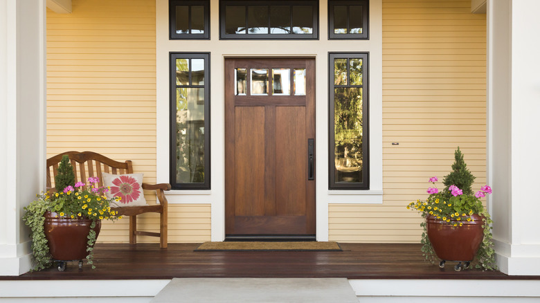 Porch with pale yellow paint