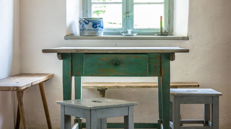 Exposed teal paint table