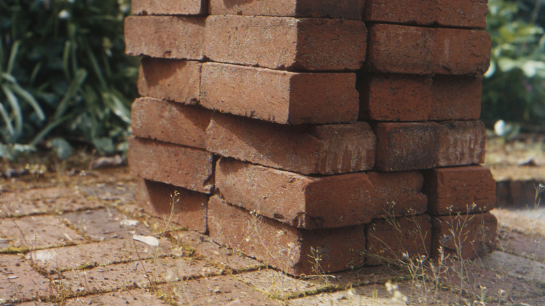 Stacked bricks on pavers