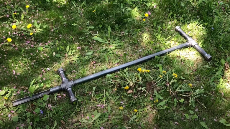 DIY pipe tool on grass