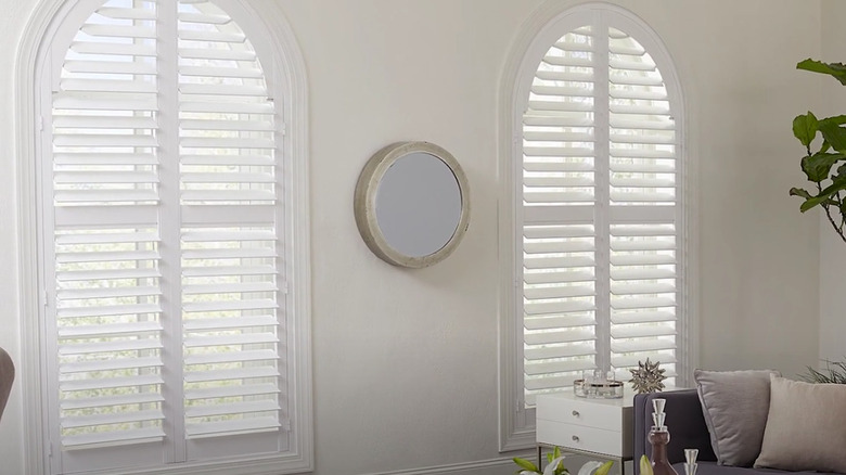 Custom curved blinds in window