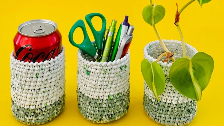 Crocheted plarn container used as soda cozy, pen holder, and planter