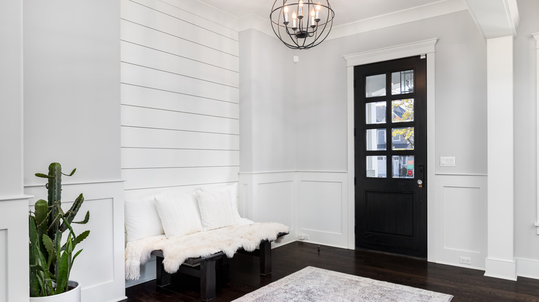 white foyer with shiplap nook 
