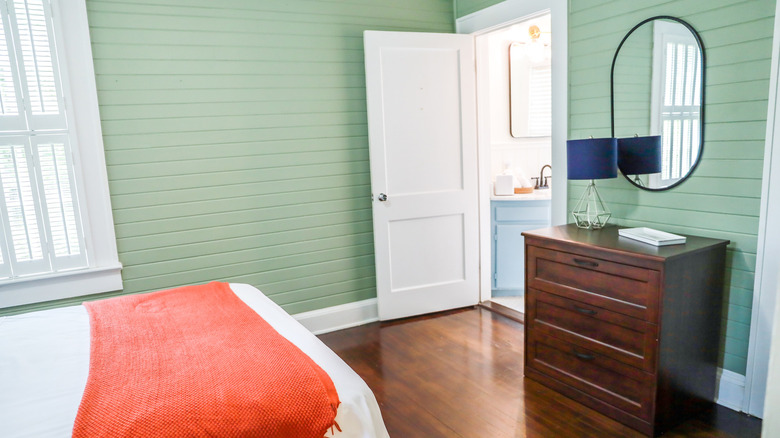 green shiplap bedroom
