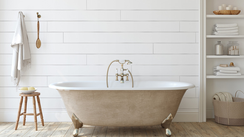 bathroom with  shiplap wall