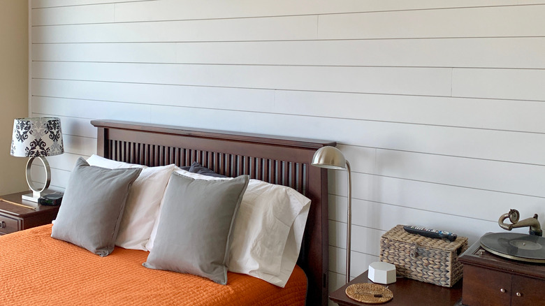 bedroom with shiplap statement wall