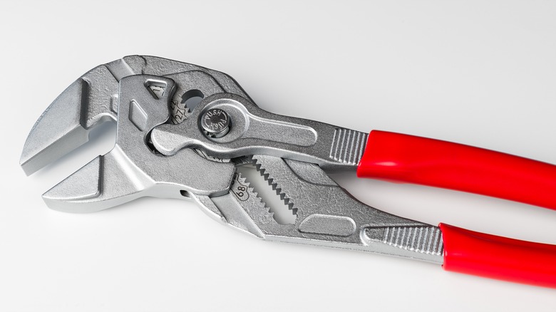 Tongue and groove pliers on white background