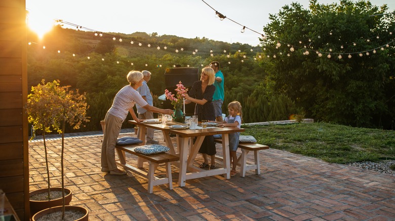 family around outdoor table