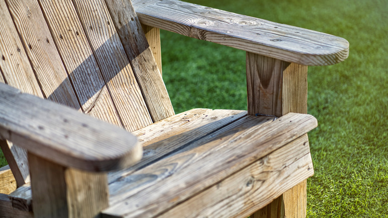 Worn Adirondack chair