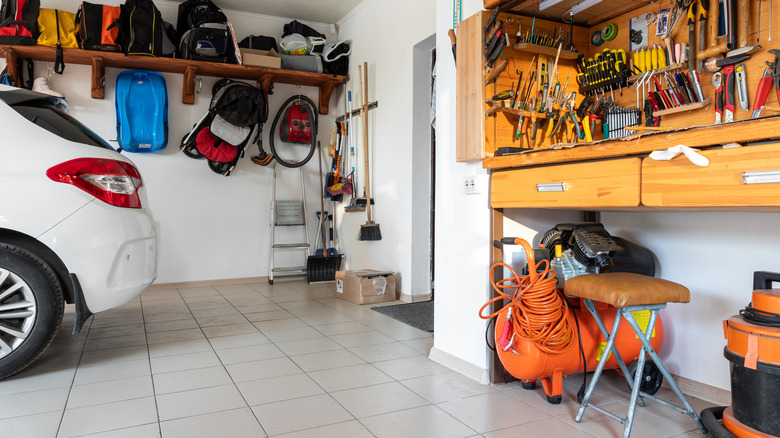 Tools and car in garage